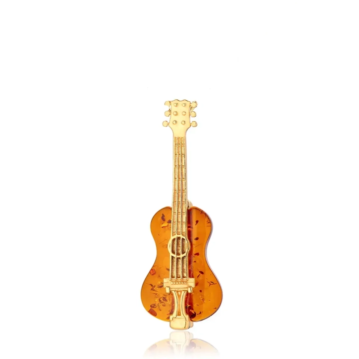 nowoczesna-broszka-srebrna-pozłacana-z-koniakowym-bursztynem-gitara-lawaiia-kopia.webp